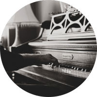 Black and white photo of a grand piano